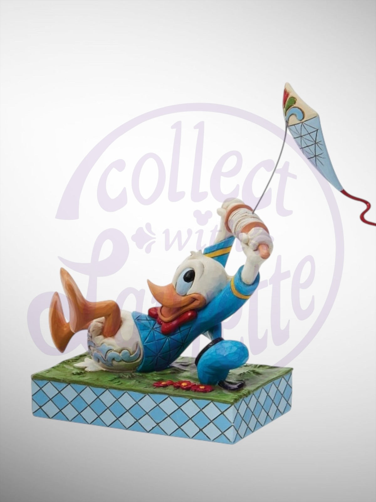 Jim Shore Disney Traditions - A Flying Duck Donald Duck Kite Figurine